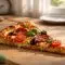 Temps de conservation de la pizza cuite hors du frigo : combien de temps peut-elle rester délicieuse ?