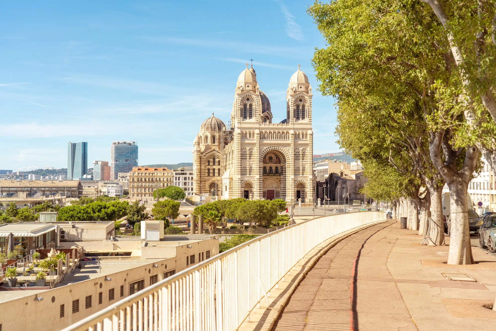 Sunny day view of a grand cathedral La Mayor in Marseille with twin towers beside